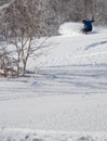 Snowboarder ripping into the fresh snow