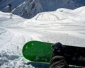 Snowboarder sitting resting on track