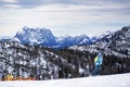 Snowboarder on slope at Lofer ski resort in winter, Austria