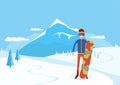 Snowboarder with a snowboard on the background of winter mountains