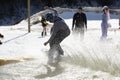 Snowboarder on a snowboard.Snowboarding down the mountain with overcoming