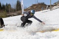 Snowboarder on a snowboard.Snowboarding down the mountain with overcoming