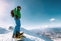 Snowboarder stay on the mountain top Royalty Free Stock Photo