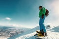 Snowboarder stay on the mountain top Royalty Free Stock Photo