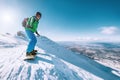 Snowboarder stay on the mountain top, Tatranska Lomnica, Slovakia Royalty Free Stock Photo