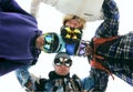 Snowboarders in circle looking down Royalty Free Stock Photo