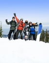 Snowboarders and skiers on mountain