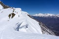 Snowboarders walking uphill for freeride