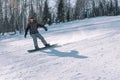 Snowboarding from a snowy mountain. Active lifestyle. Health