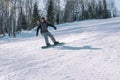 Snowboarding from a snowy mountain. Active lifestyle. Health