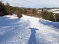 Snowboarding with sun on snow and view