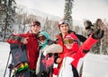 snowboarding team in winter mountains Royalty Free Stock Photo