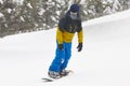 Snowboarding under the snow. Ski slope. White winter mountain Royalty Free Stock Photo