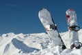 Snowboards in snowy mountains