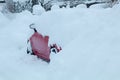 Snowbound car at the street