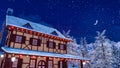 Illuminated european rural house at winter night