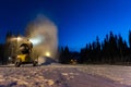 Snowcannon working late producing snow Royalty Free Stock Photo