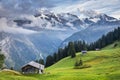 Snowcapped Bernese Swiss alps and Murren village, Switzerland Royalty Free Stock Photo