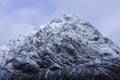 Snowcapped mountain peak in Scottish highlands
