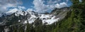 Snowcapped mountains landscape with blue sky and clouds