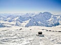 Snowcat on mountain. View on mounting ridge caucas Royalty Free Stock Photo