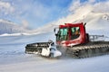 Snowcat rides to work in the evening Royalty Free Stock Photo