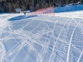 Snowcat tracks in the snow. The stripes form an amazing snowy texture