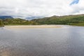 Snowdonia, River Dwyryd, sandbank, rocky hills and trees. Royalty Free Stock Photo