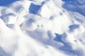 Snowdrift close-up, winter landscape, deep shadows from the sun Royalty Free Stock Photo