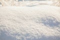 Snowdrift in the forest on a clear sunny day. Snow texture Royalty Free Stock Photo