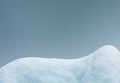Snowdrift isolated on gray blue background close-up