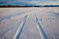 Snowdrift and tire tracks