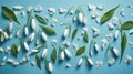 Snowdrop flowers on blue background. Spring flowers. Flat lay, top view. generative ai Royalty Free Stock Photo