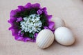 Snowdrop flowers and wooden eggs. Greeting card