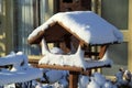 Snowed Bird Feeder Royalty Free Stock Photo