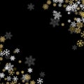 Snowfall background with golden snowflakes blurred in the dark