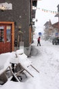 Cityscape - narrow streets covered with snow in the resort town of Pinzolo, Dolomites, Italy, Europe.