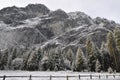 Snowfall on granite cliffs Royalty Free Stock Photo