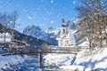 Snowfall in Ramsau, the parish church Saint Sebastian in winter, Ramsau, Berchtesgaden, Bavaria