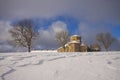 Snowfall on the Sanctuary of San Miguel de Aralar. Royalty Free Stock Photo