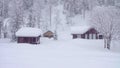 Snowfall in the skitouring lodge in Siberia