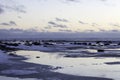 Snowfield and water scenery of early spring on big lake Royalty Free Stock Photo