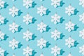 Snowflake on ablue background. Pattern. Minimal design.
