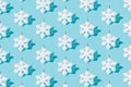 Snowflake on ablue background. Pattern. Minimal design. Royalty Free Stock Photo