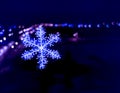 Snowflake with blurred color background.