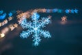 Snowflake with blurred color background.