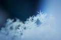 Snowflake background, frozen winter. Closeup, macro Royalty Free Stock Photo