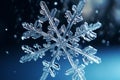 Snowflake closeup isolated on winter snow blue background. Copy space. Ice crystal. Frozen water in snowflake shape. Winter Royalty Free Stock Photo