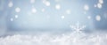 snowflake ice crystal shape blurry lights and snow falling on a cold winter. Snowfall texture of snowflakes on blurry Royalty Free Stock Photo