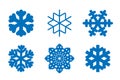 Snowflake icons set. Blue silhouette snow flake sign, isolated on white background. Flat design. Symbol of winter Royalty Free Stock Photo